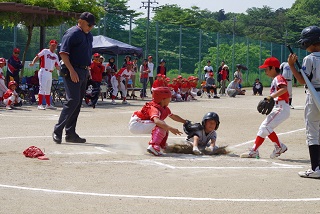 写真：ホームインする選手